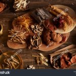 stock-photo-close-view-of-chinese-traditional-herb-ginseng-mushroom-in-wooden-table-2149734319